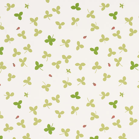 Celia Clover wallpaper by Schumacher featuring a whimsical botanical clover pattern with ladybugs and honeybees on an ivory background.