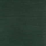 Haruki Sisal in Kismet by Schumacher - deep green textured sisal wallcovering, shown as a roll and flat surface