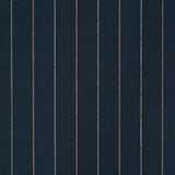 Draper Stripe wallpaper in Surf Camp by Backdrop for Schumacher, featuring multicolor vertical pinstripes on a dark ground.