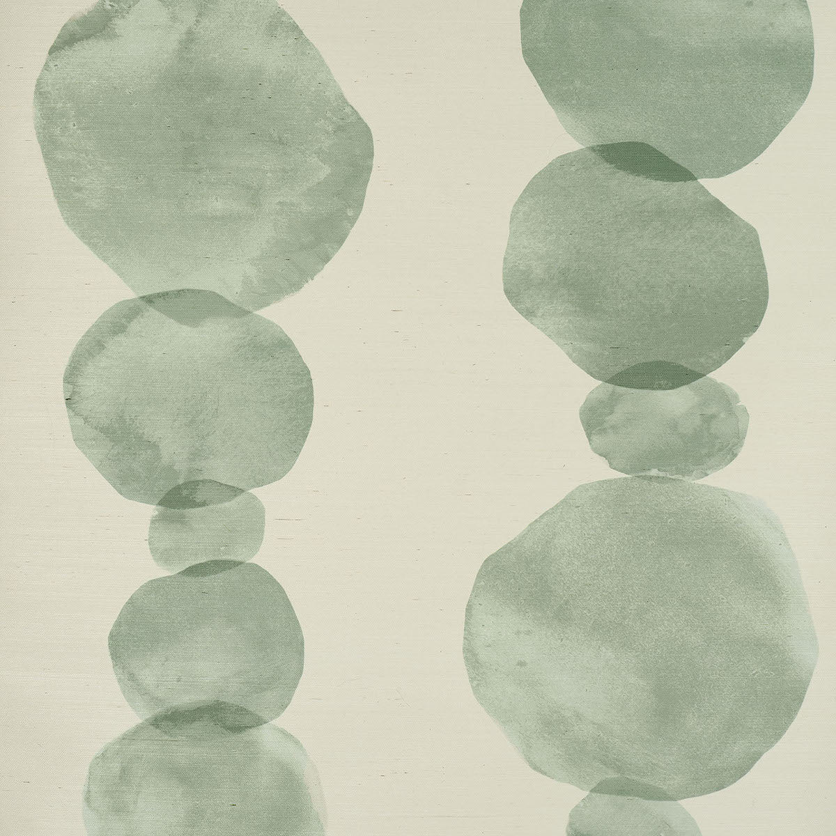 Hyperion Sisal wallpaper in Soft Green by Schumacher, featuring large-scale circular ink wash forms on a natural sisal texture.