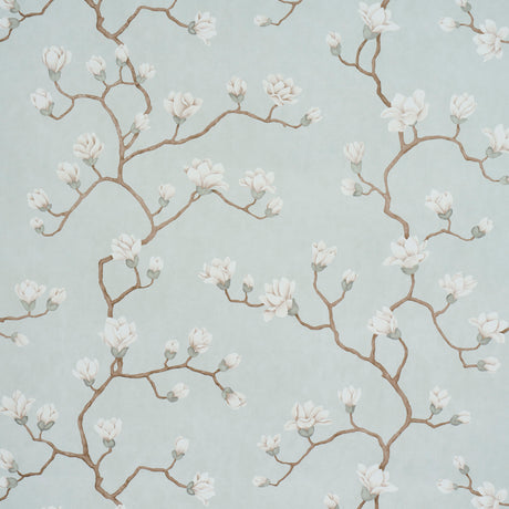 Magnolia Tree wallpaper in Dusty Sky by Schumacher, featuring large-scale white magnolia blossoms on blue background.