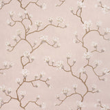 Magnolia Tree wallpaper in Dusty Blush by Schumacher, featuring large-scale hand-painted magnolia blossoms on a soft blush background.