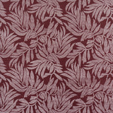 Tayrona Palm Mosaic Sisal wallpaper in Coconut Latte by Johanna Ortiz for Schumacher, featuring a hand screen printed palm frond pattern on paper-backed sisal.