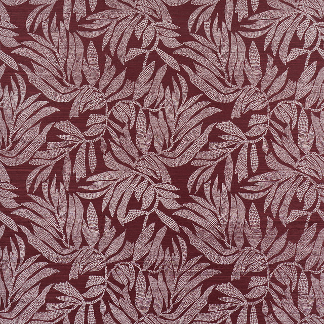 Tayrona Palm Mosaic Sisal wallpaper in Coconut Latte by Johanna Ortiz for Schumacher, featuring a hand screen printed palm frond pattern on paper-backed sisal.