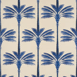 A Palm Is A Palm Sisal wallpaper in Indigo Palm Grove by Johanna Ortiz for Schumacher, featuring stylized blue palm trees on a textured sisal background.