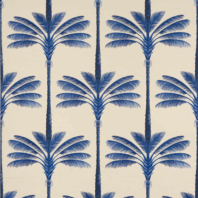 A Palm Is A Palm Sisal wallpaper in Indigo Palm Grove by Johanna Ortiz for Schumacher, featuring stylized blue palm trees on a textured sisal background.
