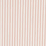 Emma Stripe Narrow wallpaper in blush by Schumacher, featuring narrow vertical stripes in a soft pink hue, shown in a styled bathroom setting.
