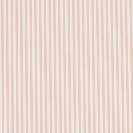 Emma Stripe Narrow wallpaper in blush by Schumacher, featuring narrow vertical stripes in a soft pink hue, shown in a styled bathroom setting.