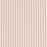 Emma Stripe Narrow wallpaper in Rose by Schumacher, featuring narrow vertical stripes in a soft pink hue, shown as a roll and installed in a bathroom setting.