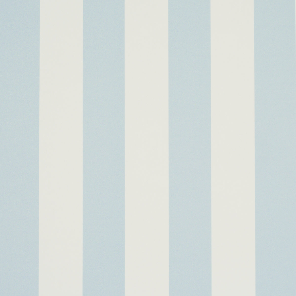 Emma Stripe wallpaper in Sky by Schumacher, featuring classic blue and white vertical stripes, shown in a styled bathroom interior.