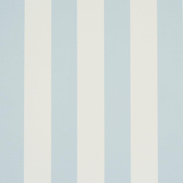 Emma Stripe wallpaper in Sky by Schumacher, featuring classic blue and white vertical stripes, shown in a styled bathroom interior.