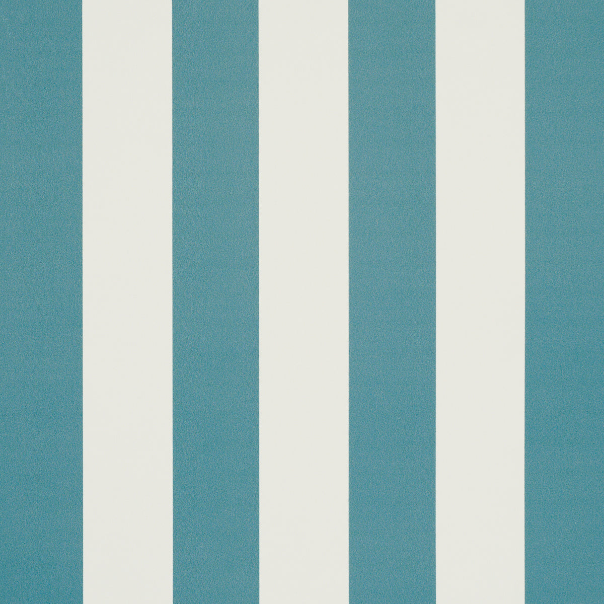 Emma Stripe Azure wallpaper by Schumacher featuring bold blue and white vertical stripes, shown in a styled bathroom interior.