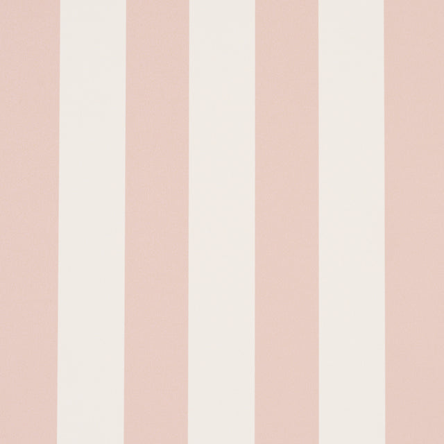 Emma Stripe blush and white vertical stripe wallpaper in a bathroom setting by Schumacher