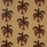 Sunbleached ochre wallpaper with whimsical coconut palm tree and dotted pattern by Johanna Ortiz for Schumacher.