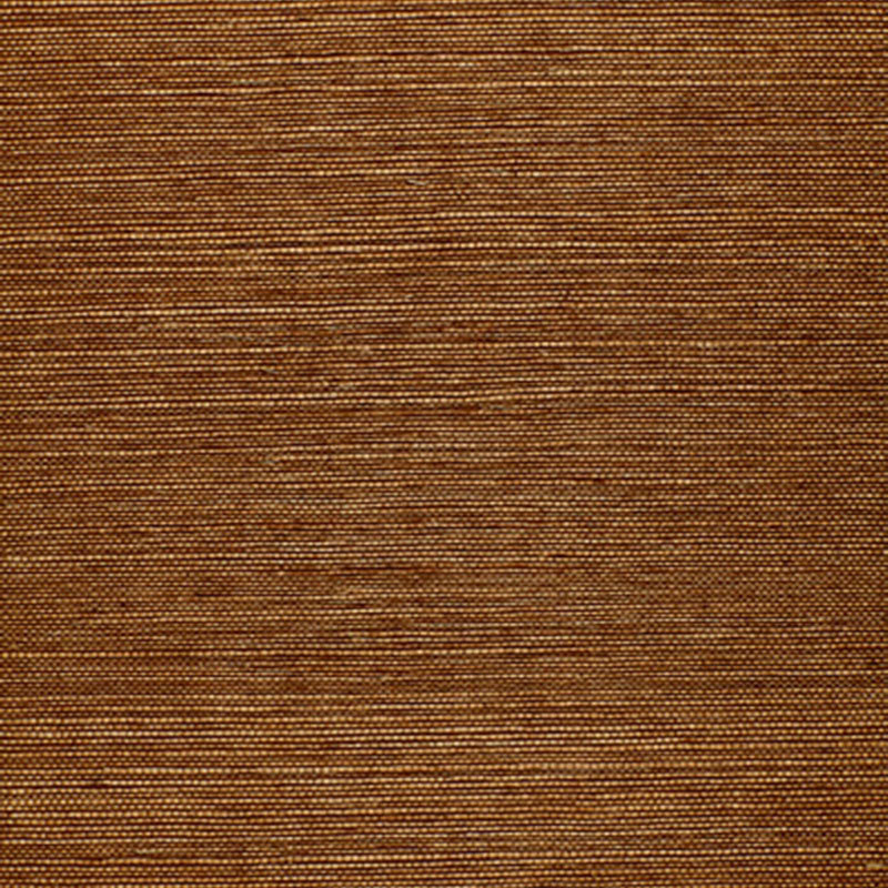 Osan Sisal dark camel natural grasscloth wallpaper by Schumacher, shown in a close-up and installed in a living room interior.