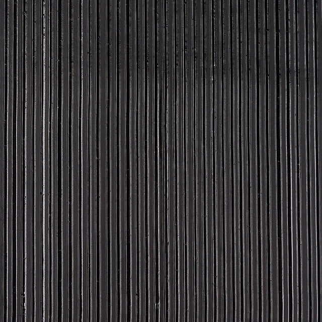 Rimini Rib Onyx handcrafted wallcovering with pronounced corded texture by Schumacher, shown in a modern kitchen setting.