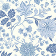 Alicia wallpaper by Boråstapeter for Schumacher, blue and white stylized floral pattern, shown in a bright living room setting.
