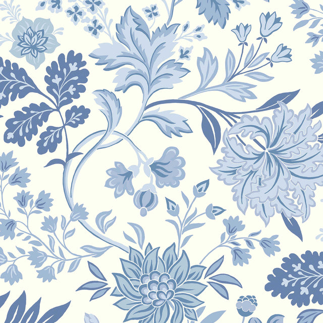 Alicia wallpaper by Boråstapeter for Schumacher, blue and white stylized floral pattern, shown in a bright living room setting.
