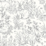 Forest Friends wallpaper in ivory with illustrated woodland animals including rabbits, foxes, squirrels, and hedgehogs by Boråstapeter for Schumacher.