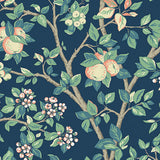 Ingrid Marie wallpaper in navy by Boråstapeter for Schumacher, featuring painterly apple trees with fruit and blossoms on a dark blue background.