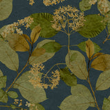 Castanum Bloom Midnight Blue floral wallpaper roll and room scene