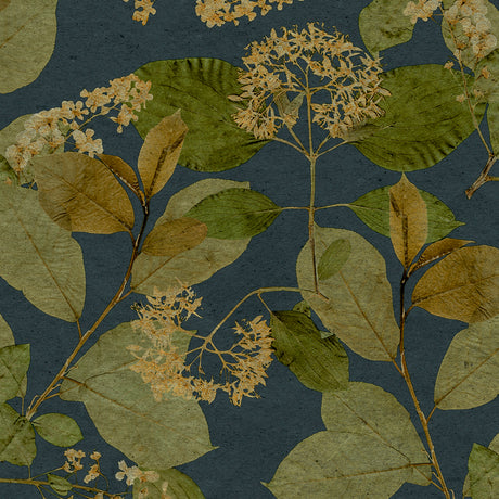 Castanum Bloom Midnight Blue botanical floral wallpaper sample on navy with green leaves.