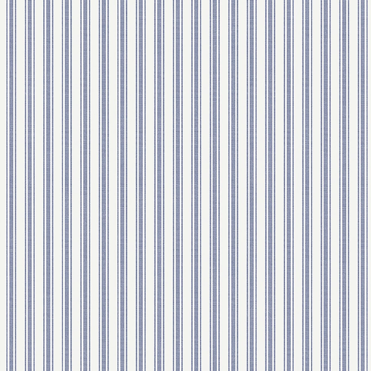 Blue and white pinstripe wallpaper by Boråstapeter for Schumacher, styled in a Scandinavian interior setting.