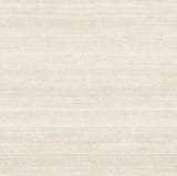 First Light Ivory striated non woven wallpaper roll and bathroom installation view