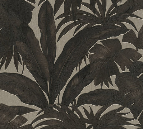 Versace Paragon wallpaper in Black Tile with large tropical botanical leaves, satin finish.