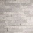 Mortimer Taupe Brick Wallpaper showing stacked stone design in warm taupe.