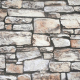 Norman Neutral Stone wallpaper roll showing realistic stacked stone design in greys and tans