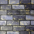 Myron Charcoal Metallic Brick wallpaper with gold accents by Arthouse
