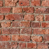 Clifford Red Urban Brick wallpaper roll showing rustic red brick pattern