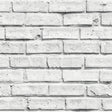 Abner White Brick Wallpaper roll with realistic white-painted brick pattern by Arthouse