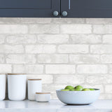Studio Brick White by InHome WallPops Peel and Stick Realistic White Brick Pattern Wallpaper 20.5 in x 18 ft - ARW4228