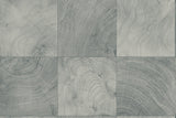 Seabrook Designs Kemi wallpaper in Blueberry, a matte Type II vinyl with geometric tile-like woodgrain rings in gray-blue tones.