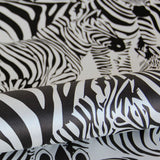 Jemima Black Zebra Wallpaper with Glam Animal Print in Non Woven Unpasted - Origin DD347453