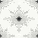 North Star geometric starburst wallpaper in Snowbound with metallic finish