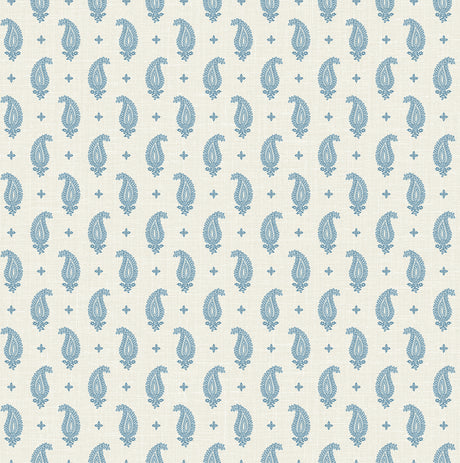 Maia Paisley wallpaper in Bleu Bisque with blue paisley motifs on a light bisque linen-look ground.