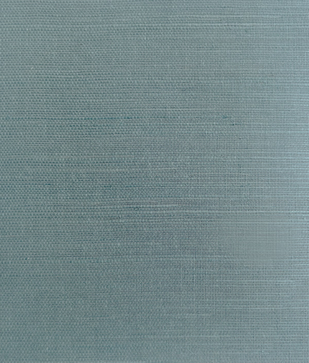 Bluestone blue sisal grasscloth texture wallpaper with subtle woven horizontal and vertical fibers.