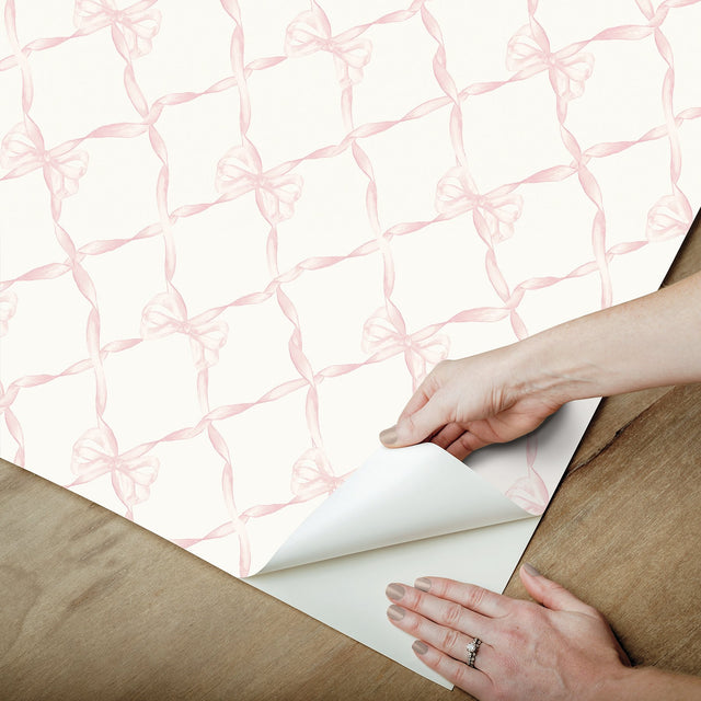 Baby Bow Pink Jam Peel & Stick Wallpaper with Whimsical Novelty Bow Trellis - NuWallpaper LFS5012