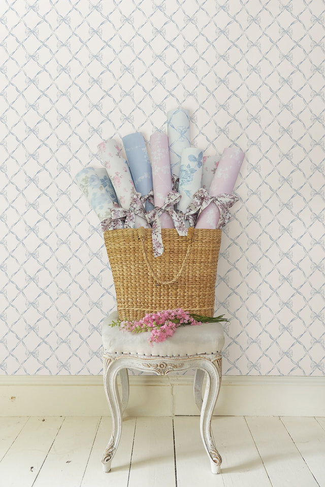 Baby Bow Dreamy Sky Peel & Stick Wallpaper with Whimsical Blue Ribbon Trellis - NuWallpaper LFS5013