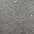 Graphite cork grasscloth wallpaper with subtle metallic silver accents and natural cork texture.