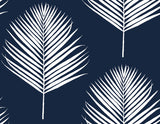 Midnight blue peel and stick wallpaper with white palm fronds, Maui Palm pattern