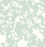 Mono Toile peel and stick wallpaper in Seaglass with white chinoiserie-inspired floral and bird silhouettes.