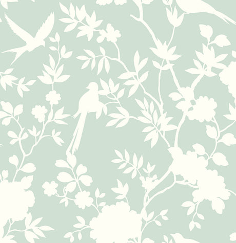 Mono Toile peel and stick wallpaper in Seaglass with white chinoiserie-inspired floral and bird silhouettes.