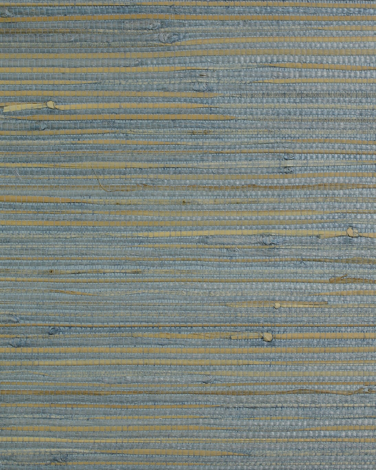Island Blue grasscloth wallpaper texture with woven blue fibers and natural tan horizontal slubs.