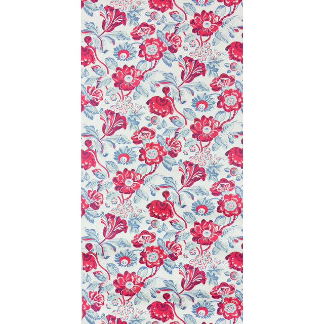MICHEL wallpaper in Capri by Raoul Textiles for Schumacher, featuring a vibrant hand-printed floral pattern in red and blue tones.