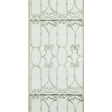 St. Germain Moss wallpaper by Raoul Textiles for Schumacher, featuring an artisanal hand-printed pattern reminiscent of decorative wrought iron in soft green tones.