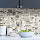 Published Charcoal Peel & Stick Wallpaper with Vintage Newspaper Advertisements - NuWallpaper NUS3626